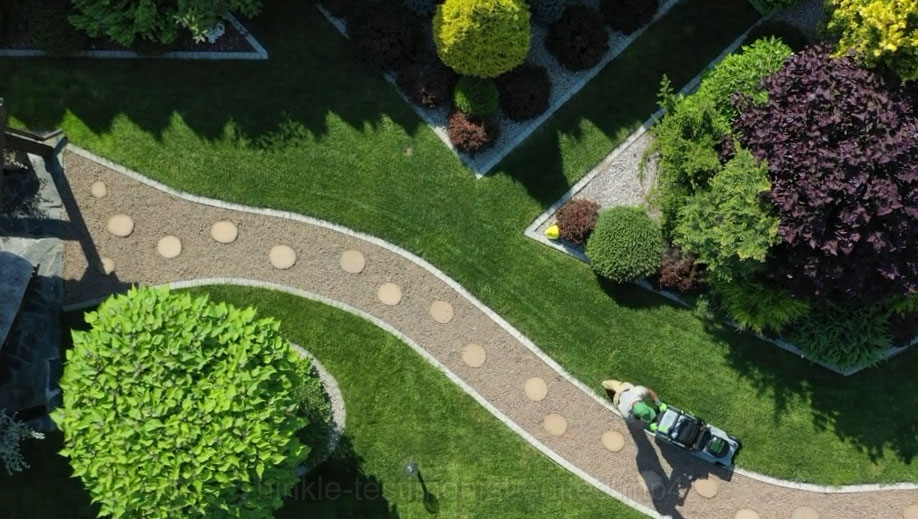 aerial sidewalk view with green grass