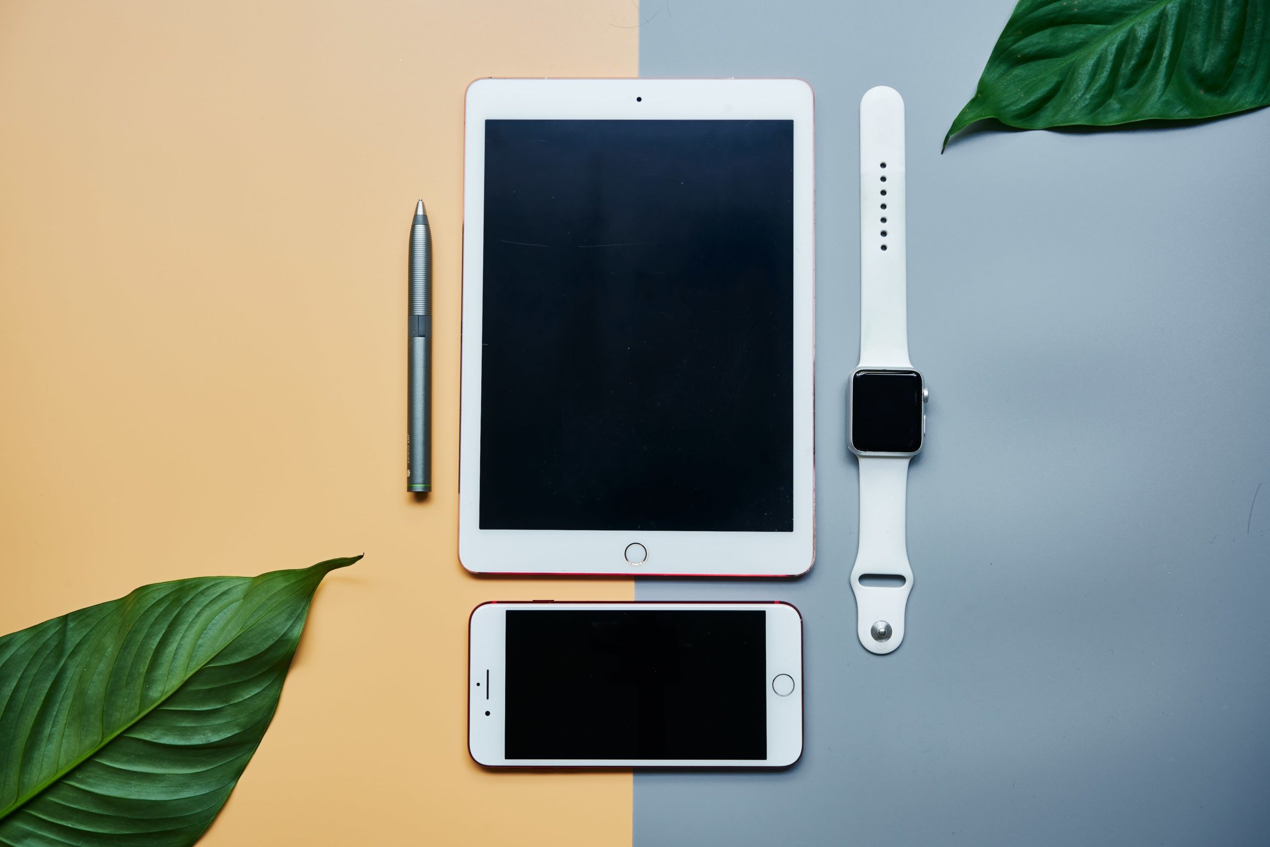 Image of Apple products representing brand loyalty when you use a scalable marketing plan -min